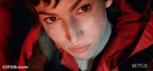 A Close Up Of A Person 'S Face With Netflix Written On The Bottom . GIF