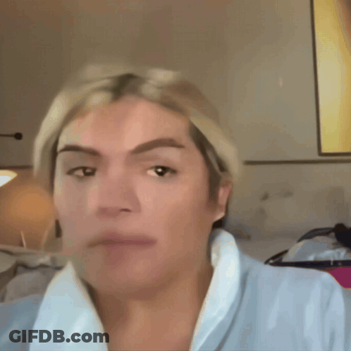 A Close Up Of A Person 'S Face With One Eye Closed GIF