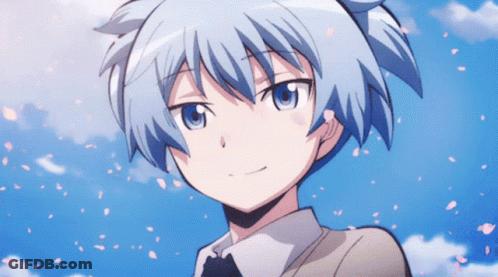 A Close Up Of A Person 'S Face With Petals Falling From The Sky GIF