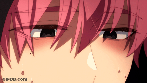 A Close Up Of A Person 'S Face With Pink Hair And Black Eyes GIF