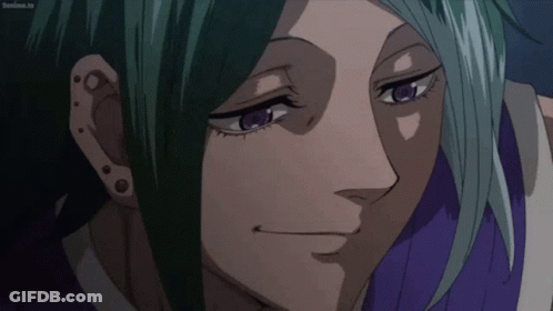 A Close Up Of A Person 'S Face With Purple Eyes GIF