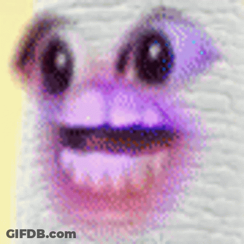 A Close Up Of A Person 'S Face With Purple Eyes And Purple Lips . GIF