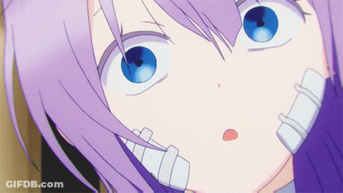 A Close Up Of A Person 'S Face With Purple Hair GIF
