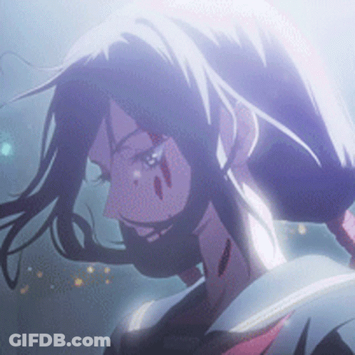 A Close Up Of A Person 'S Face With Purple Hair GIF