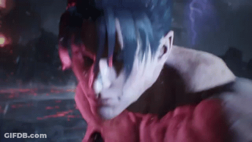 A Close Up Of A Person 'S Face With Red And Blue Paint On It . GIF