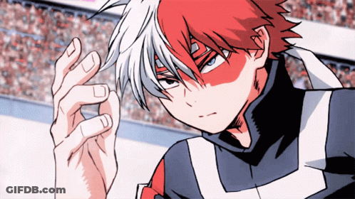 A Close Up Of A Person 'S Face With Red And White Hair GIF