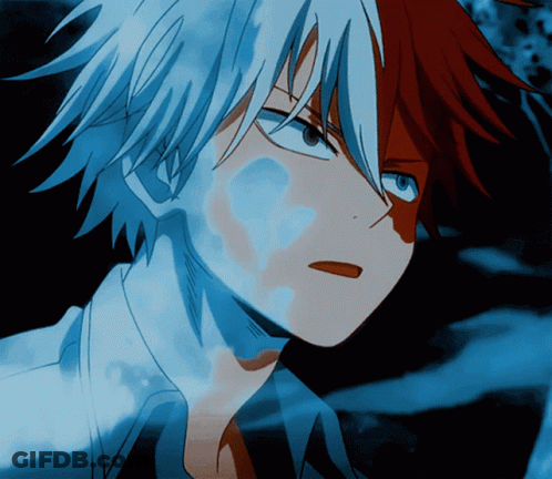 A Close Up Of A Person 'S Face With Red And White Hair GIF