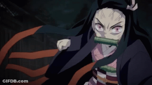 A Close Up Of A Person 'S Face With Red Eyes And A Green Nose GIF