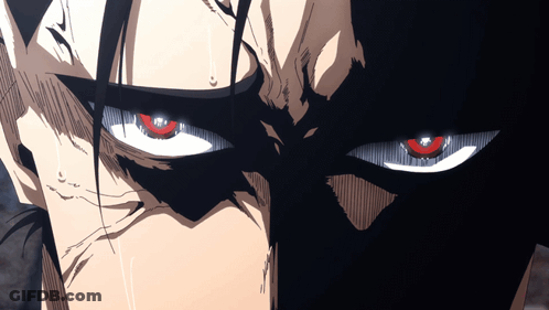 A Close Up Of A Person 'S Face With Red Eyes And Black Hair GIF