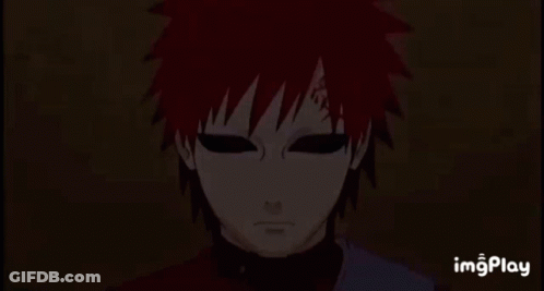 A Close Up Of A Person 'S Face With Red Hair . GIF
