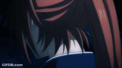 A Close Up Of A Person 'S Face With Red Hair And A Cross On It GIF