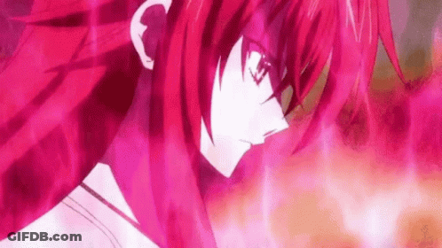 A Close Up Of A Person 'S Face With Red Hair And Glasses . GIF