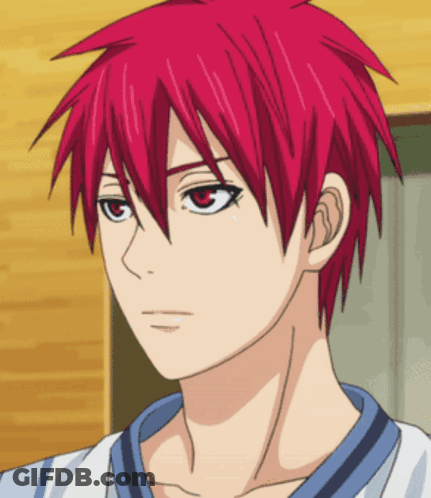A Close Up Of A Person 'S Face With Red Hair And Red Eyes GIF
