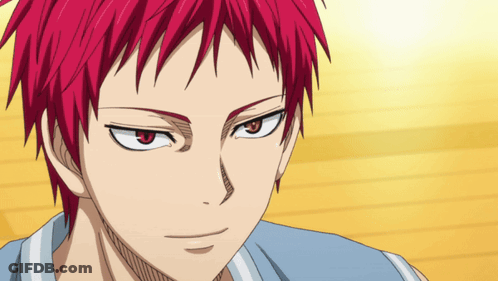 A Close Up Of A Person 'S Face With Red Hair And Red Eyes GIF