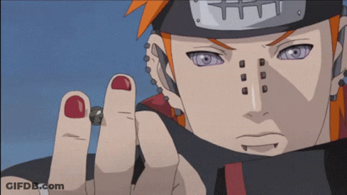 A Close Up Of A Person 'S Face With Red Nail Polish On Their Fingers GIF