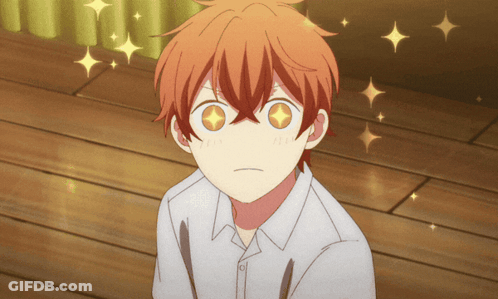 A Close Up Of A Person 'S Face With Stars Behind Them GIF