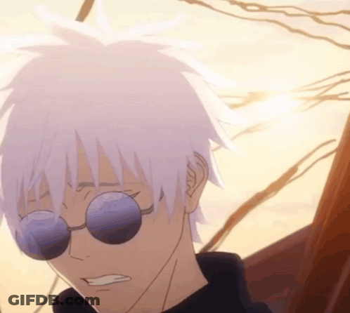 A Close Up Of A Person 'S Face With Sunglasses On GIF
