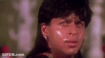 A Close Up Of A Person 'S Face With Tears Coming Out Of It . GIF