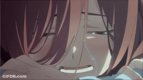 A Close Up Of A Person 'S Face With Tears Coming Out Of Their Eyes GIF