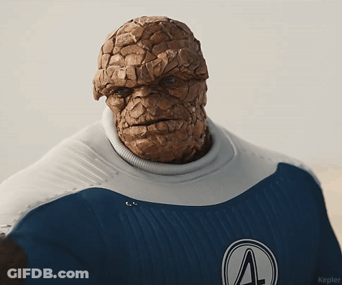 A Close Up Of A Person 'S Face With The Letter A On Their Chest GIF
