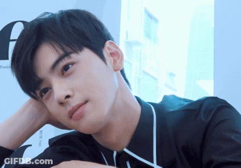 A Close Up Of A Person 'S Face With The Letter F Visible In The Background GIF