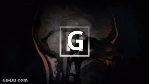 A Close Up Of A Person 'S Face With The Letter G On It GIF