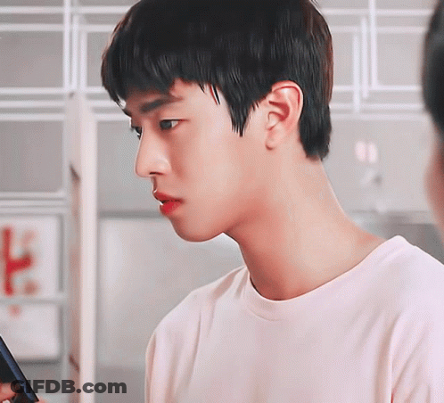 A Close Up Of A Person 'S Face With The Letter K Visible GIF