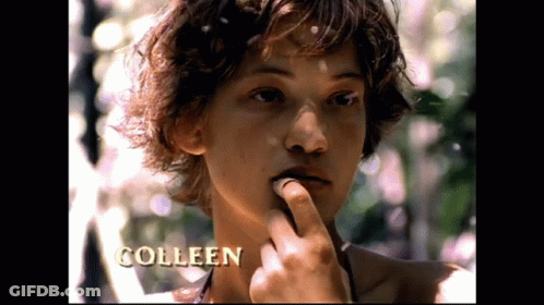 A Close Up Of A Person 'S Face With The Name Colleen On It GIF