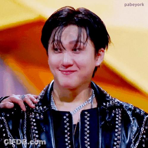 A Close Up Of A Person 'S Face With The Name Pabeyork Written On The Bottom GIF