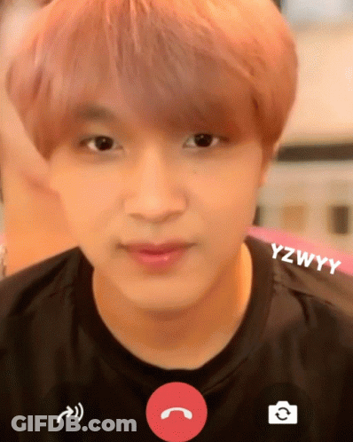 A Close Up Of A Person 'S Face With The Name Yzwwy On The Bottom GIF