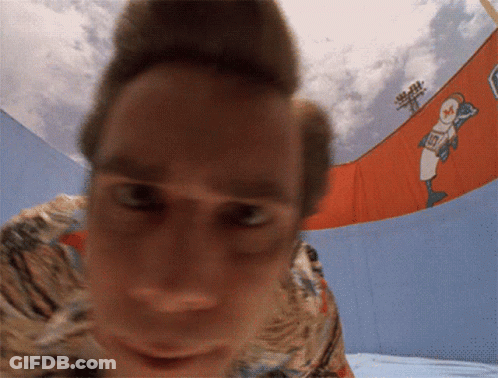 A Close Up Of A Person 'S Face With The Number 10 On The Back GIF