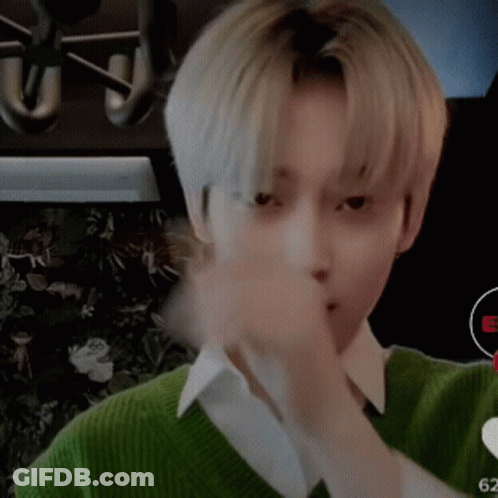 A Close Up Of A Person 'S Face With The Number 62 In The Corner GIF