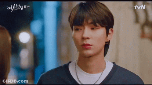 A Close Up Of A Person 'S Face With The Tvn Logo On The Bottom GIF