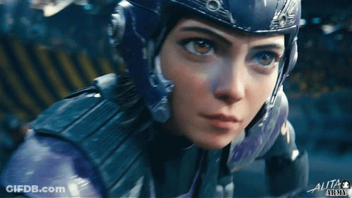 A Close Up Of A Person 'S Face With The Word Alita On The Bottom Right GIF