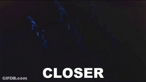 A Close Up Of A Person 'S Face With The Word Closer In White GIF