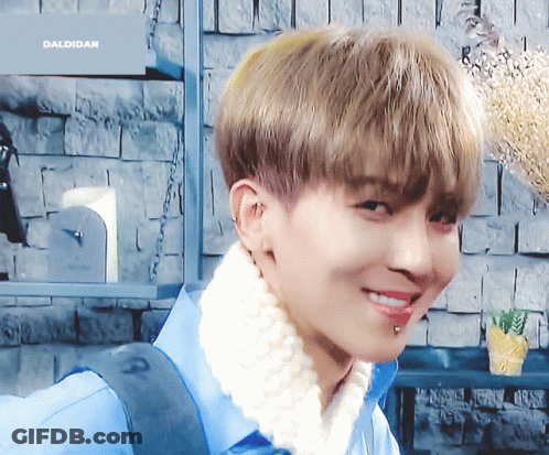 A Close Up Of A Person 'S Face With The Word Daldidan In The Background GIF