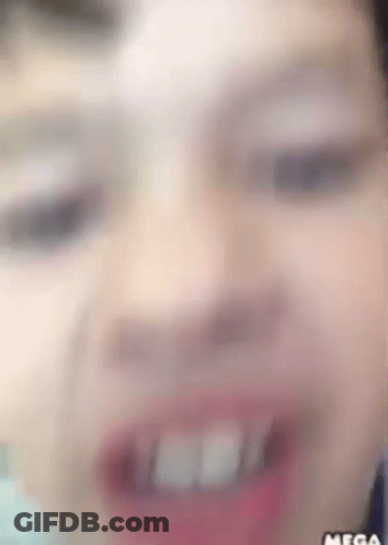 A Close Up Of A Person 'S Face With The Word Mega On The Bottom Right GIF