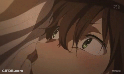 A Close Up Of A Person 'S Face With The Word Mitsukei On The Bottom GIF