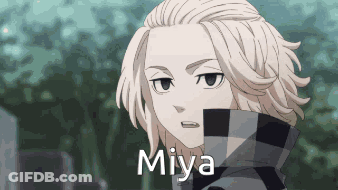 A Close Up Of A Person 'S Face With The Word Miya On It . GIF
