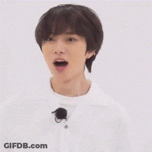 A Close Up Of A Person 'S Face With The Word Olololo Written In Red Letters GIF