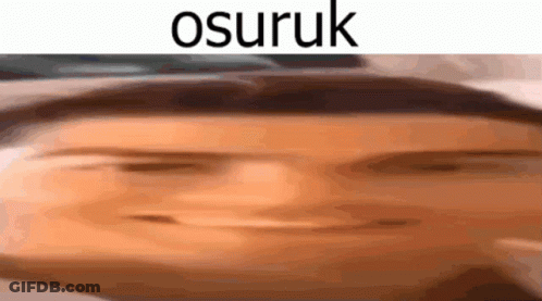 A Close Up Of A Person 'S Face With The Word Osuruk Written On It GIF