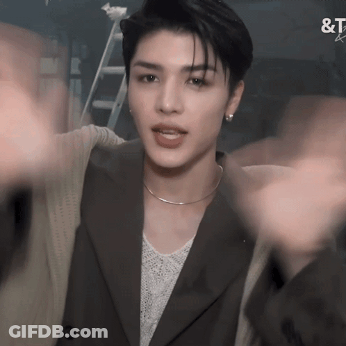 A Close Up Of A Person 'S Face With The Word & T On The Bottom Right GIF