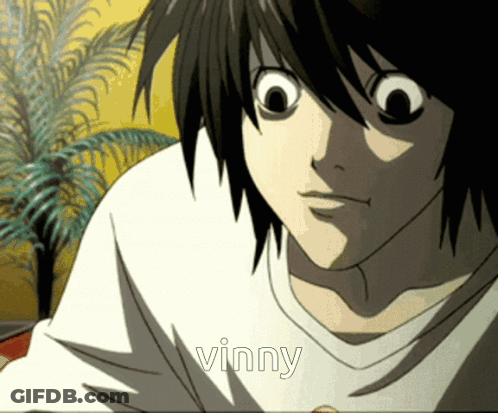 A Close Up Of A Person 'S Face With The Word Vinny On It GIF