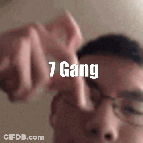 A Close Up Of A Person 'S Face With The Words 7 Gang Written Above It GIF