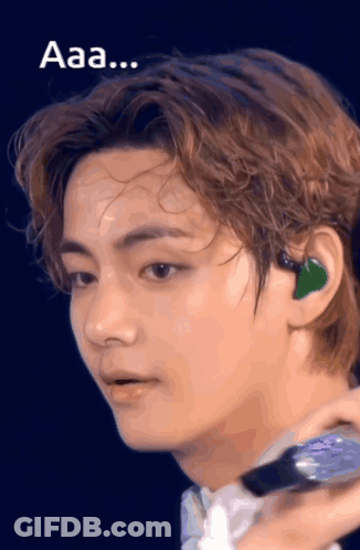 A Close Up Of A Person 'S Face With The Words " Aaa " Below It GIF