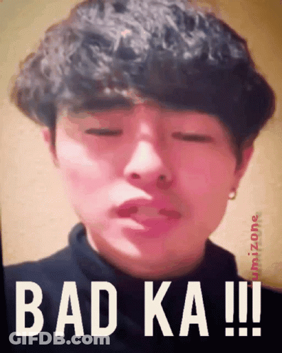 A Close Up Of A Person 'S Face With The Words Bad Ka GIF