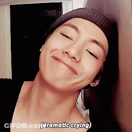 A Close Up Of A Person 'S Face With The Words Dramatic Crying Written On The Bottom GIF