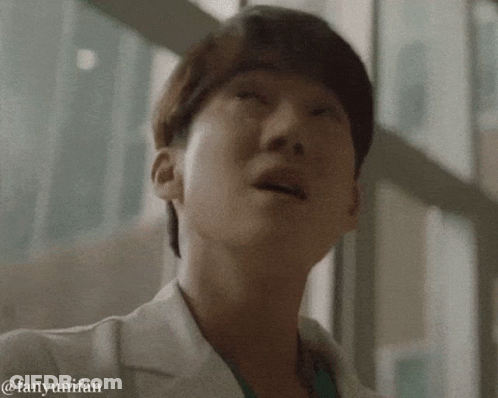 A Close Up Of A Person 'S Face With The Words Fanyunifan Written Below It GIF