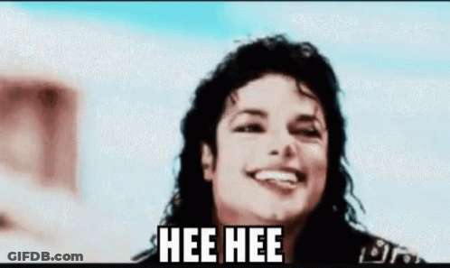 A Close Up Of A Person 'S Face With The Words Hee Hee On It . GIF