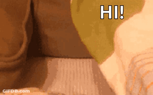 A Close Up Of A Person 'S Face With The Words Hi Written On The Bottom GIF